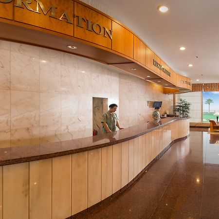 Seogwipo KAL Hotel Esterno foto Reception desk at a hotel